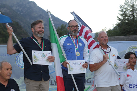 Stefano De Martini on the top step of the podium, Trout Distance gold at the 2026 World Fly Casting Championship in Vinadio